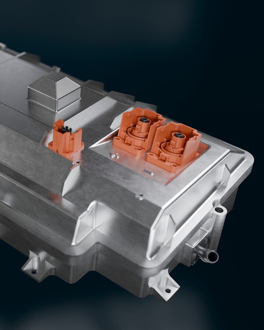 Metal housing of a high-voltage DC-DC converter with multiple electrical connectors.