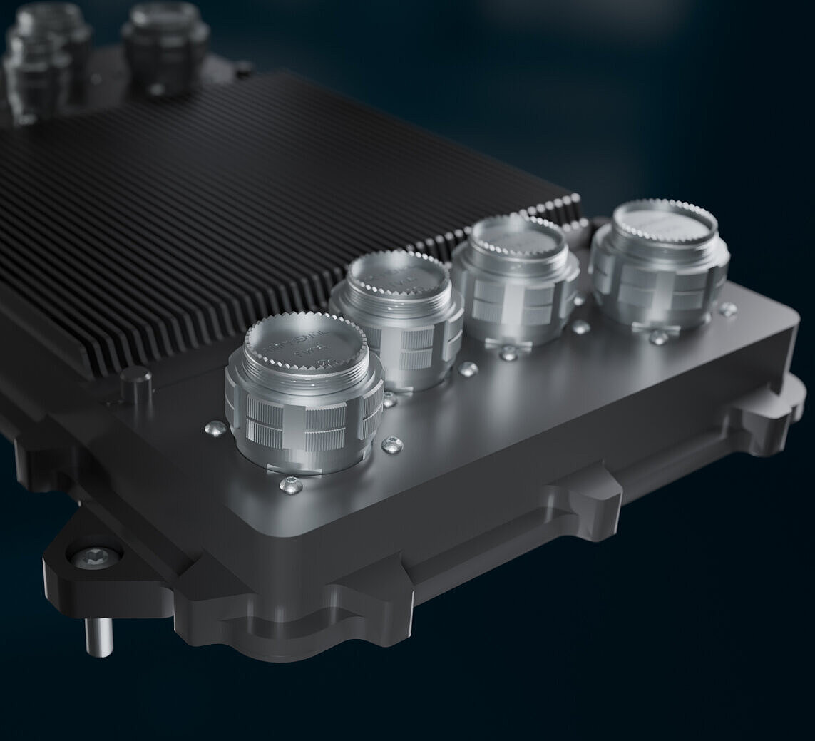 Close-up of a Silver Atena FADEC engine controller with aerospace connectors in a rugged housing.