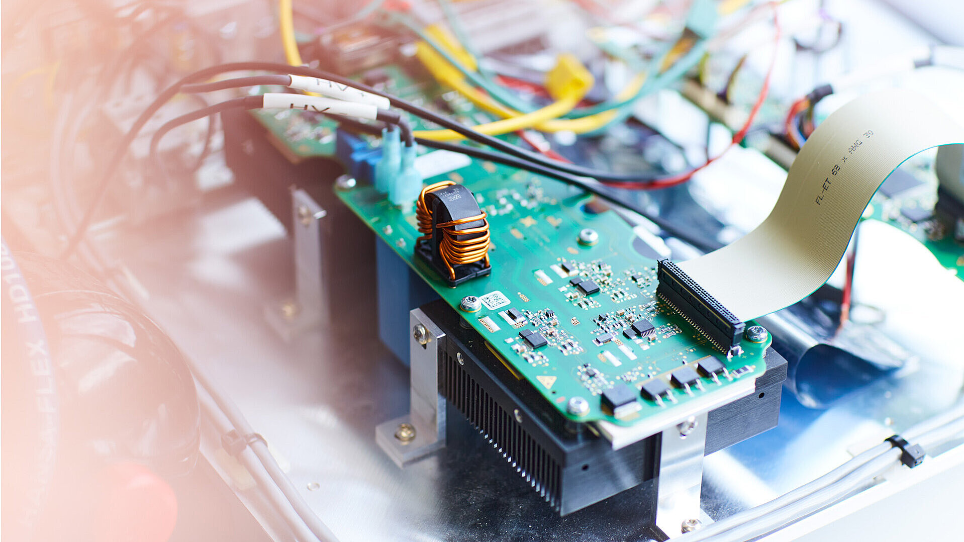Electronic circuit board of a Silver Atena development and test system with connected cables and components.
