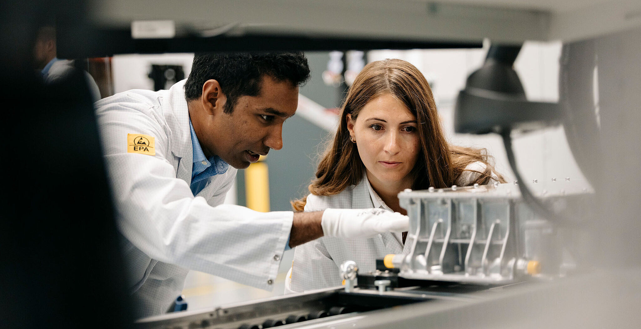 Silver Atena engineers analyzing a technical system during development in the laboratory.