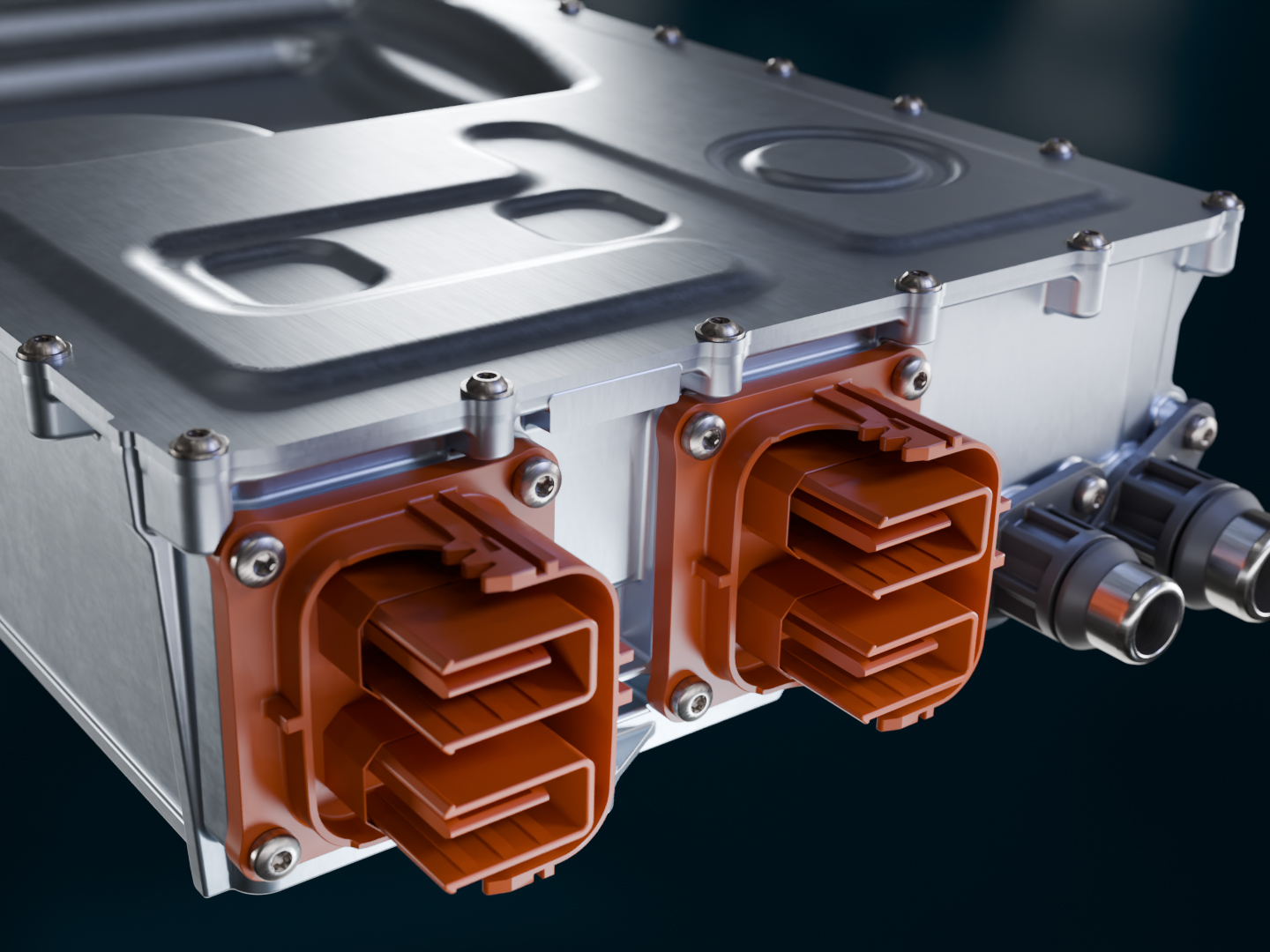 Close-up of a DC-DC converter with orange high-voltage connectors.