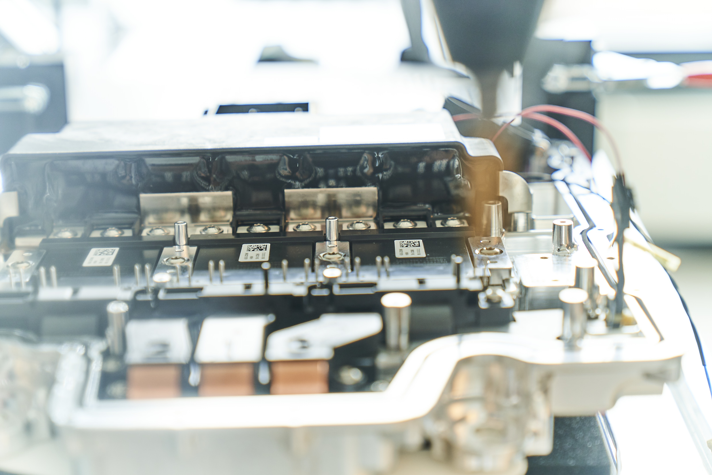 Close-up of an electronic unit with contacts and housing structure.
